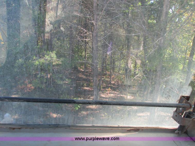 image for item E7404 John Deere 555G Series IV track loader