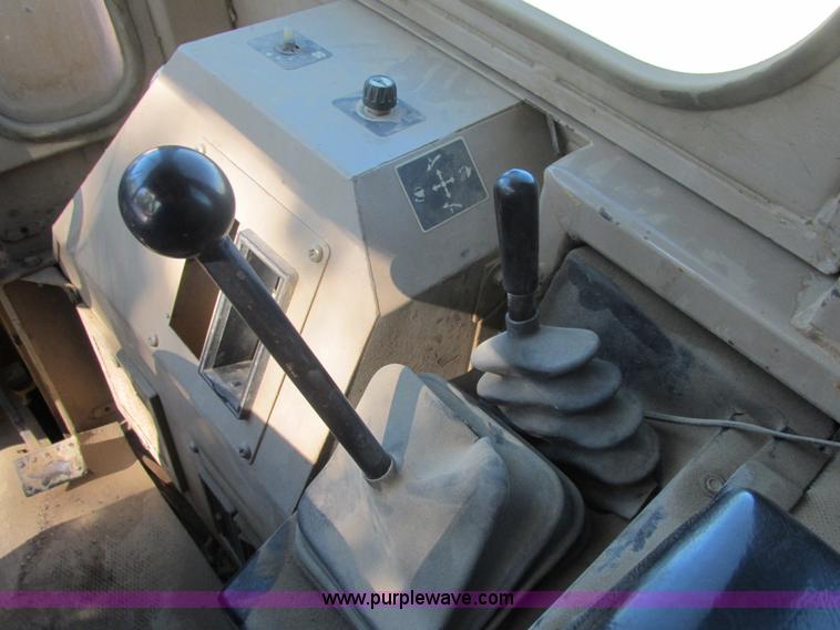 image for item E7404 John Deere 555G Series IV track loader