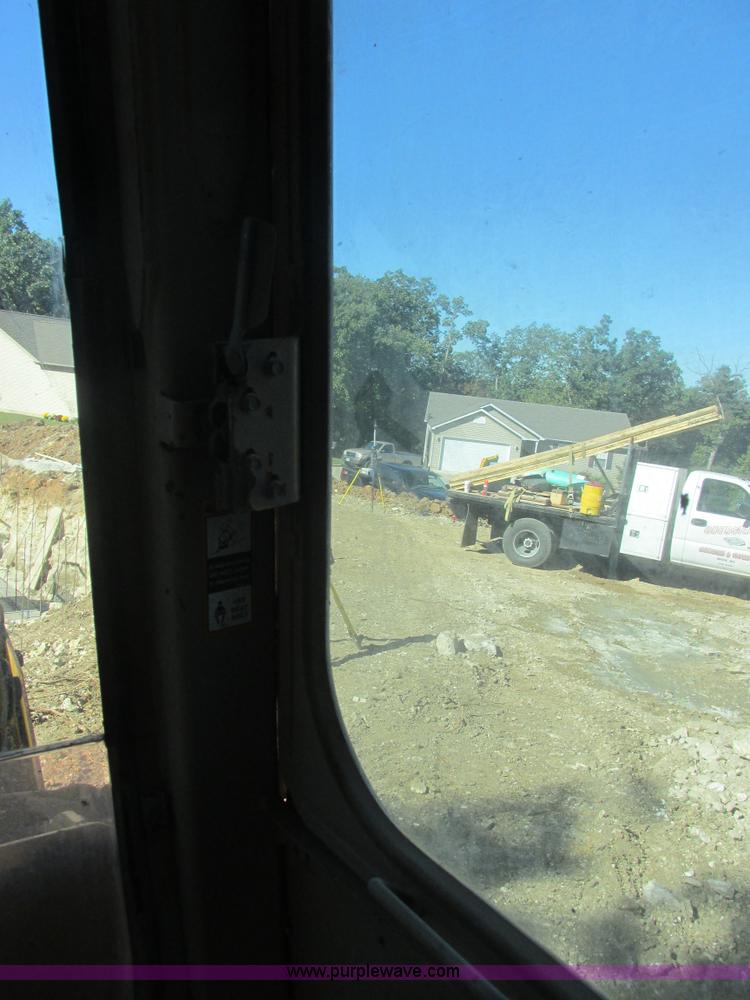 image for item E7404 John Deere 555G Series IV track loader