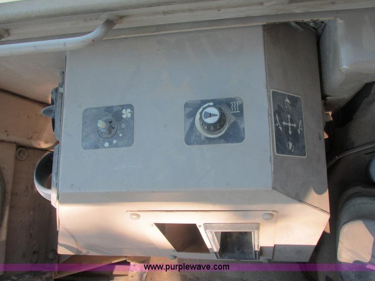 image for item E7404 John Deere 555G Series IV track loader