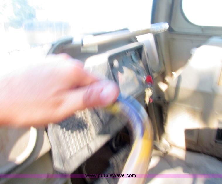 image for item E7404 John Deere 555G Series IV track loader