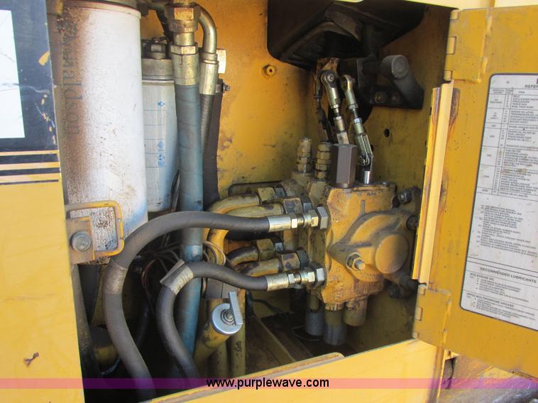 image for item E7404 John Deere 555G Series IV track loader