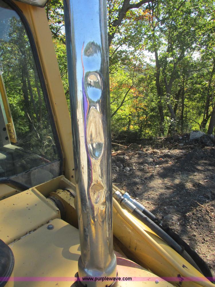 image for item E7404 John Deere 555G Series IV track loader