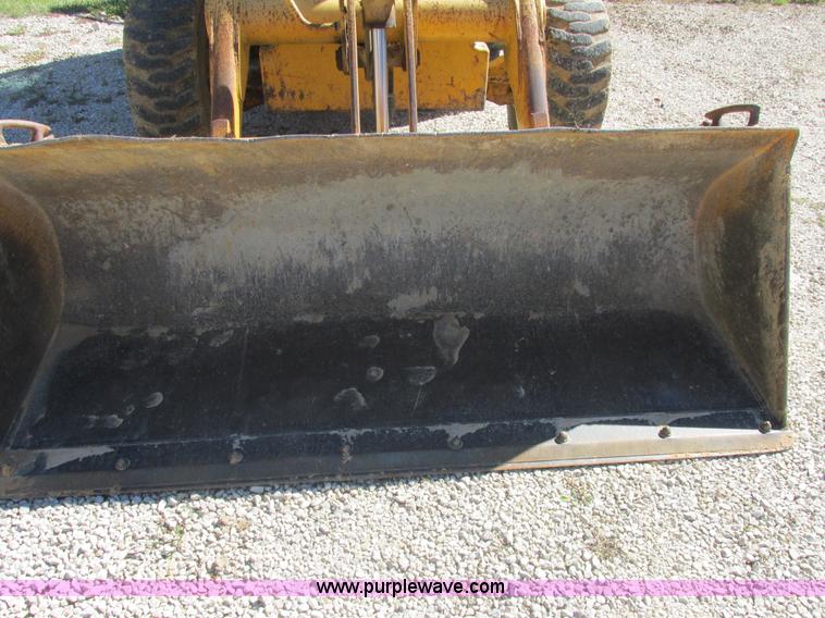 image for item E7405 1992 John Deere 310D backhoe