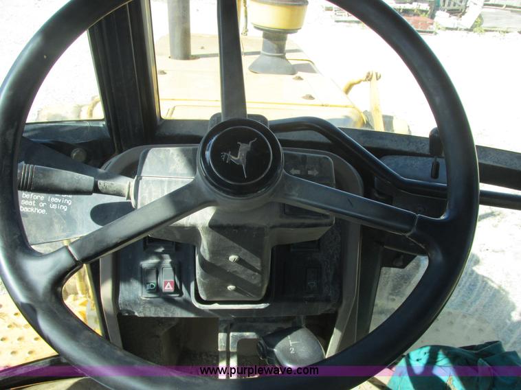 image for item E7405 1992 John Deere 310D backhoe