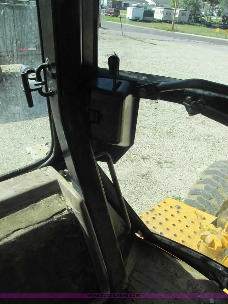 image for item E7405 1992 John Deere 310D backhoe