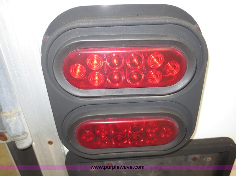 image for item F4402 2002 H&H 28' cargo trailer with living quarters