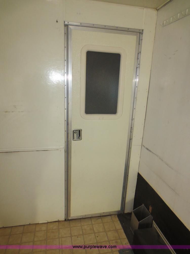 image for item F4402 2002 H&H 28' cargo trailer with living quarters