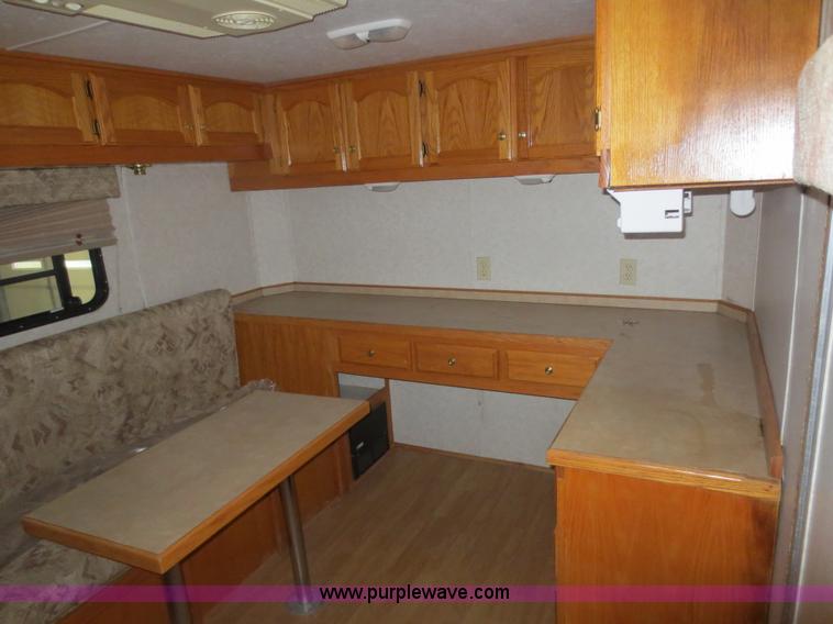 image for item F4402 2002 H&H 28' cargo trailer with living quarters