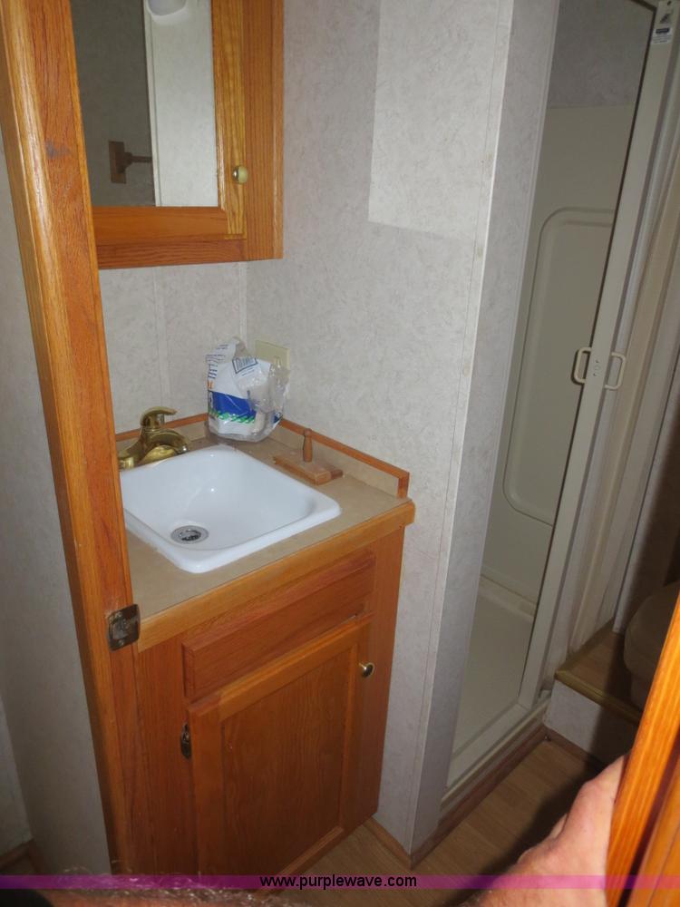 image for item F4402 2002 H&H 28' cargo trailer with living quarters