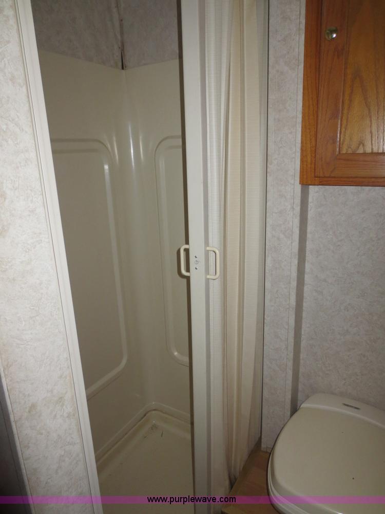 image for item F4402 2002 H&H 28' cargo trailer with living quarters