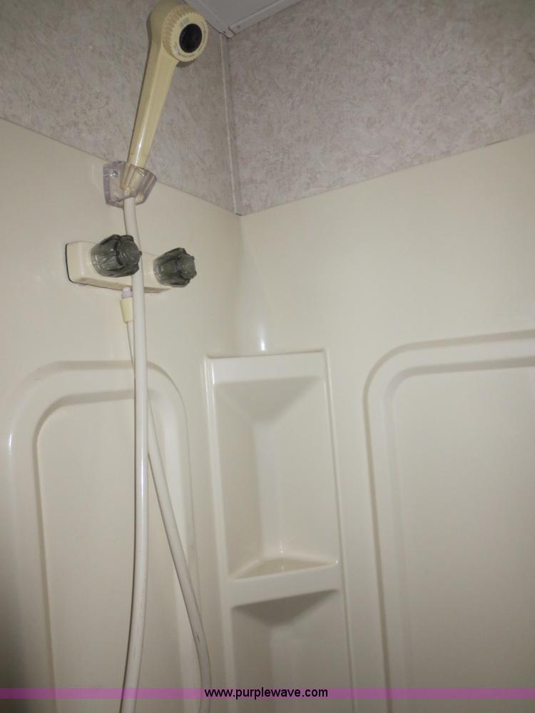 image for item F4402 2002 H&H 28' cargo trailer with living quarters