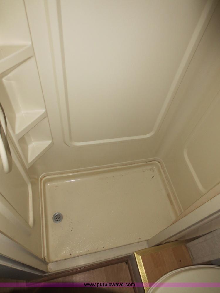 image for item F4402 2002 H&H 28' cargo trailer with living quarters