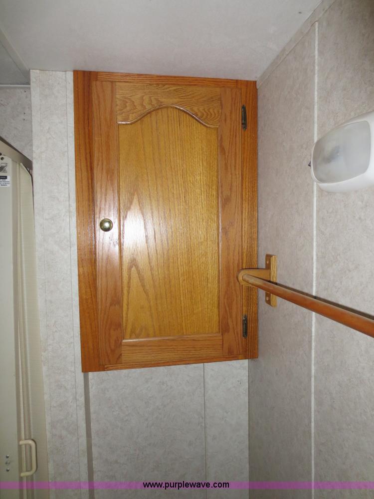 image for item F4402 2002 H&H 28' cargo trailer with living quarters