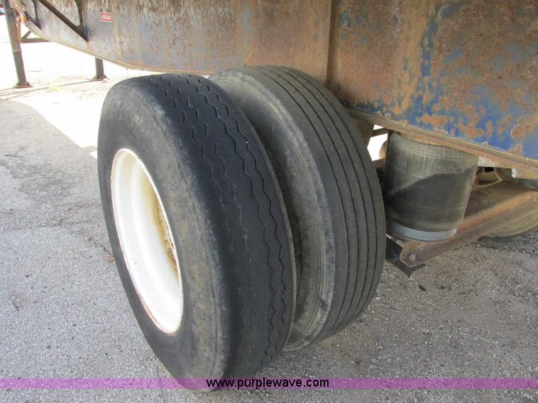 image for item F5304 1999 Fruehauf 48' flatbed spread axle trailer