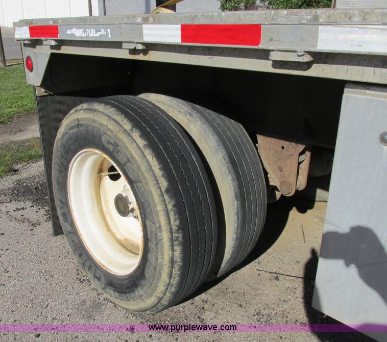 image for item F5304 1999 Fruehauf 48' flatbed spread axle trailer