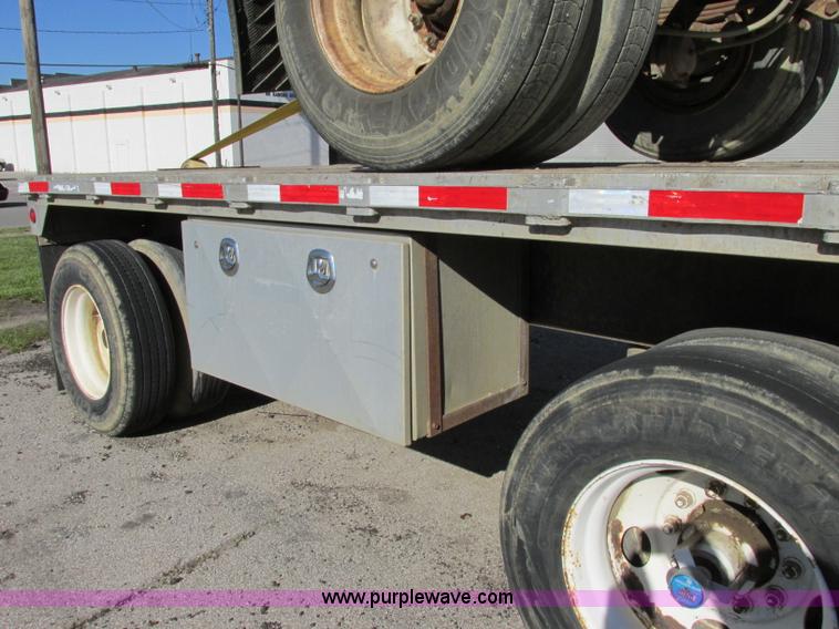 image for item F5304 1999 Fruehauf 48' flatbed spread axle trailer