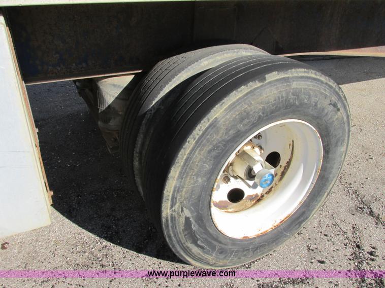 image for item F5304 1999 Fruehauf 48' flatbed spread axle trailer