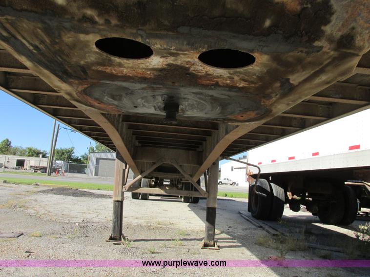 image for item F5304 1999 Fruehauf 48' flatbed spread axle trailer