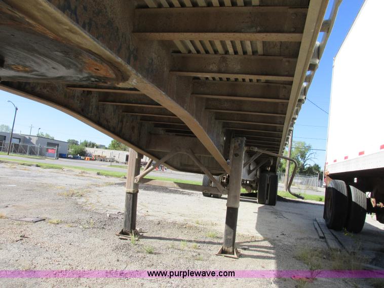 image for item F5304 1999 Fruehauf 48' flatbed spread axle trailer