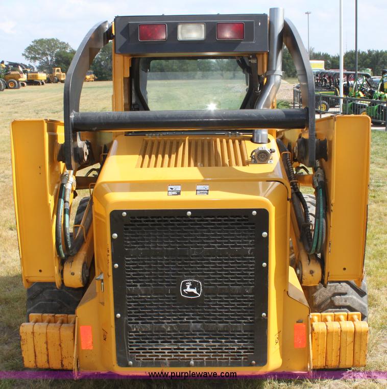 image for item G4226 John Deere 325 skid steer