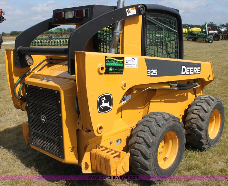 image for item G4226 John Deere 325 skid steer