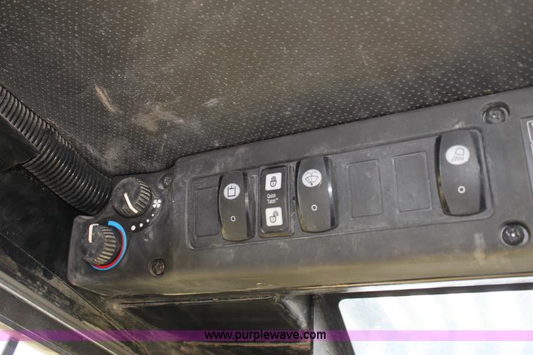 image for item G4226 John Deere 325 skid steer