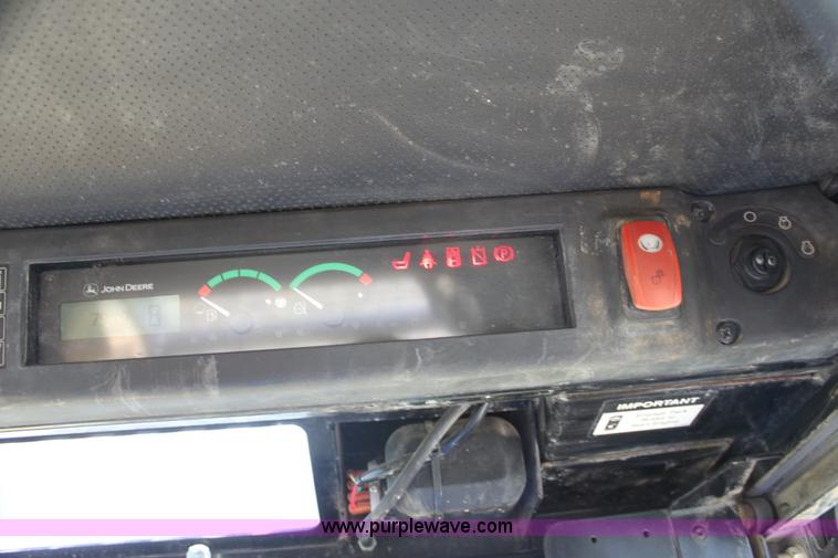image for item G4226 John Deere 325 skid steer