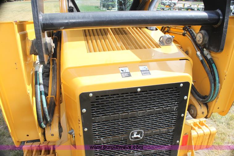 image for item G4226 John Deere 325 skid steer