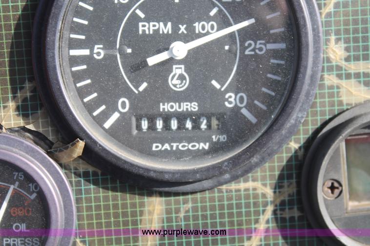 image for item I7933 1997 Ditch Witch 7610DD trencher cable plow