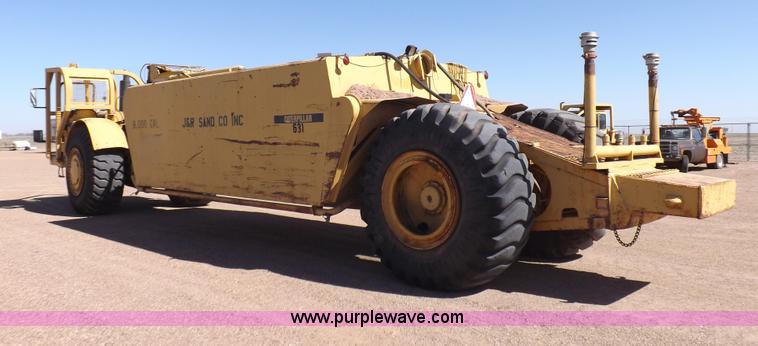 image for item I8449 Caterpillar 631 water wagon