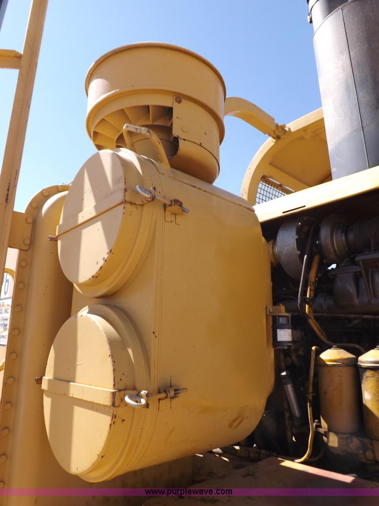 image for item I8449 Caterpillar 631 water wagon