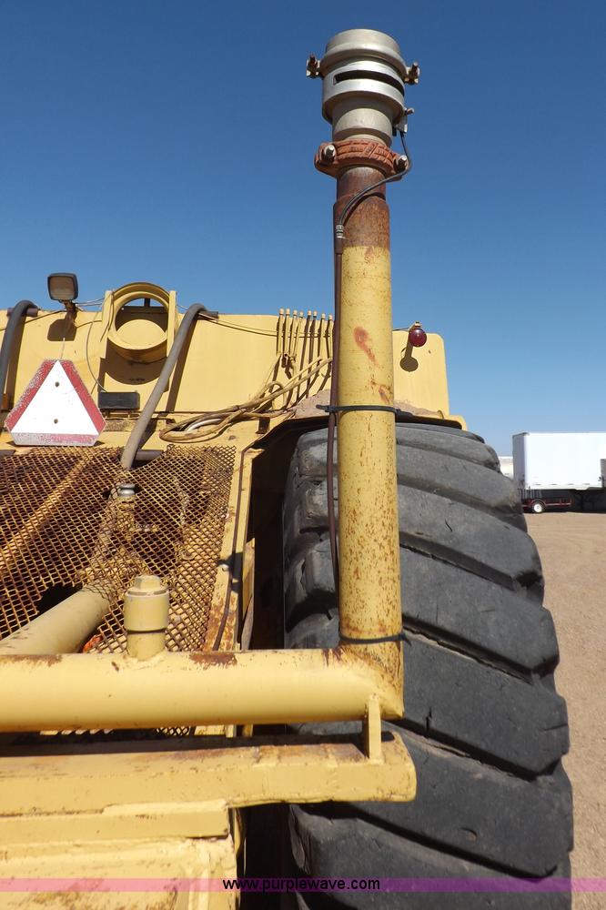 image for item I8449 Caterpillar 631 water wagon