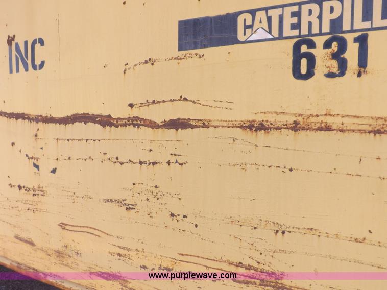 image for item I8449 Caterpillar 631 water wagon