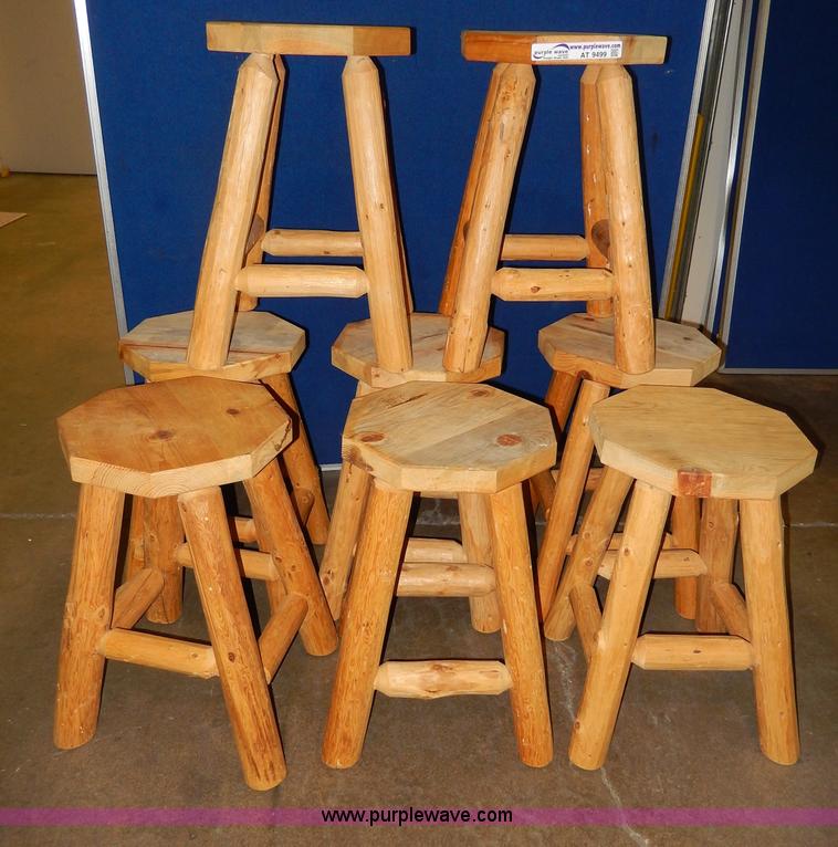 (8) wood stools in Manhattan, KS Item AT9499 sold Purple Wave