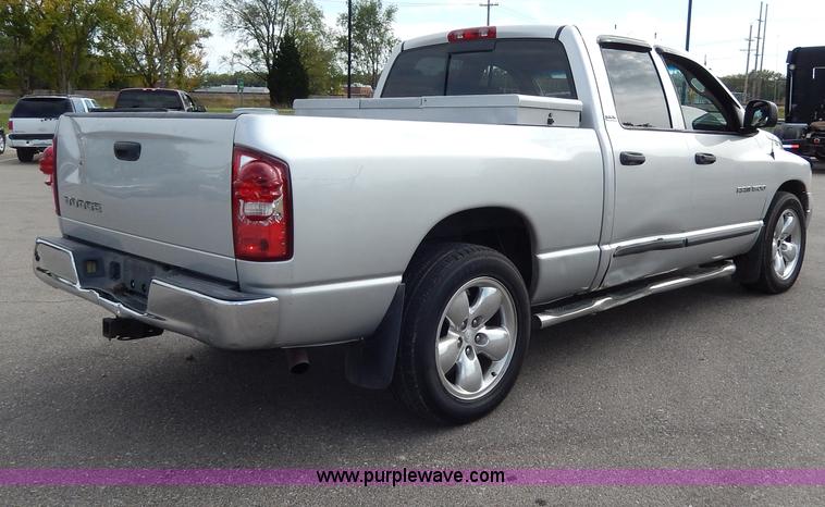 image for item H9589 2002 Dodge Ram 1500 SLT Quad Cab pickup truck