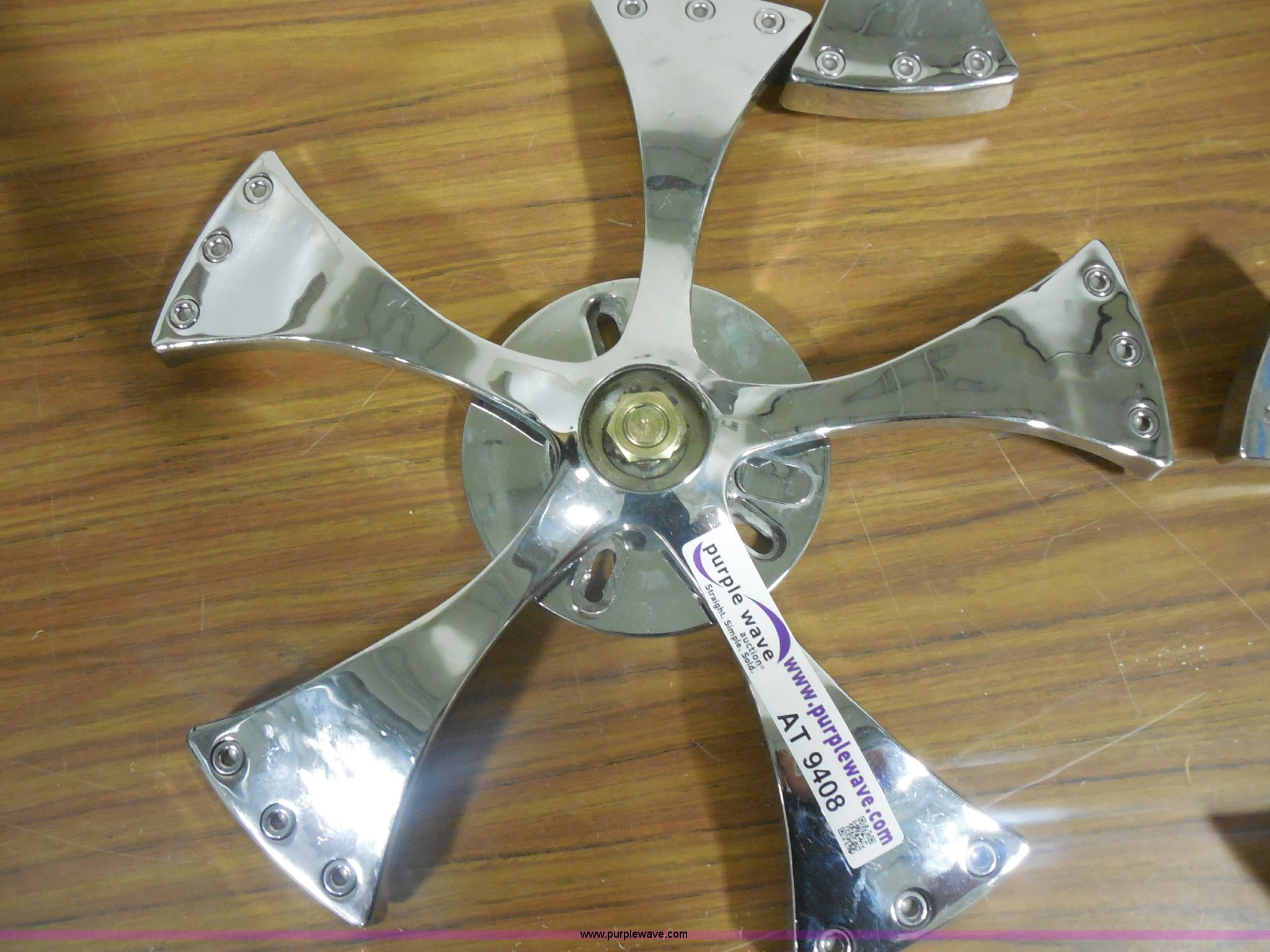 (3) chrome spinning hubcaps in Manhattan, KS Item AT9408 sold