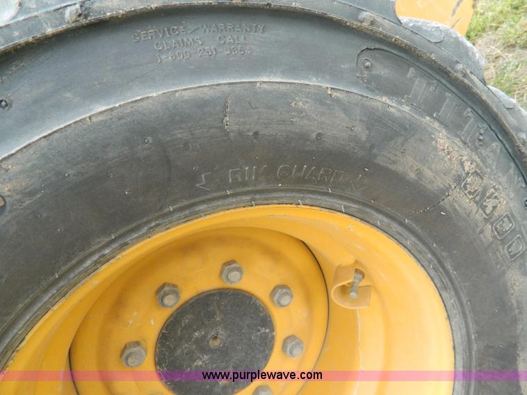 image for item AD9948 2000 John Deere 250 skid steer