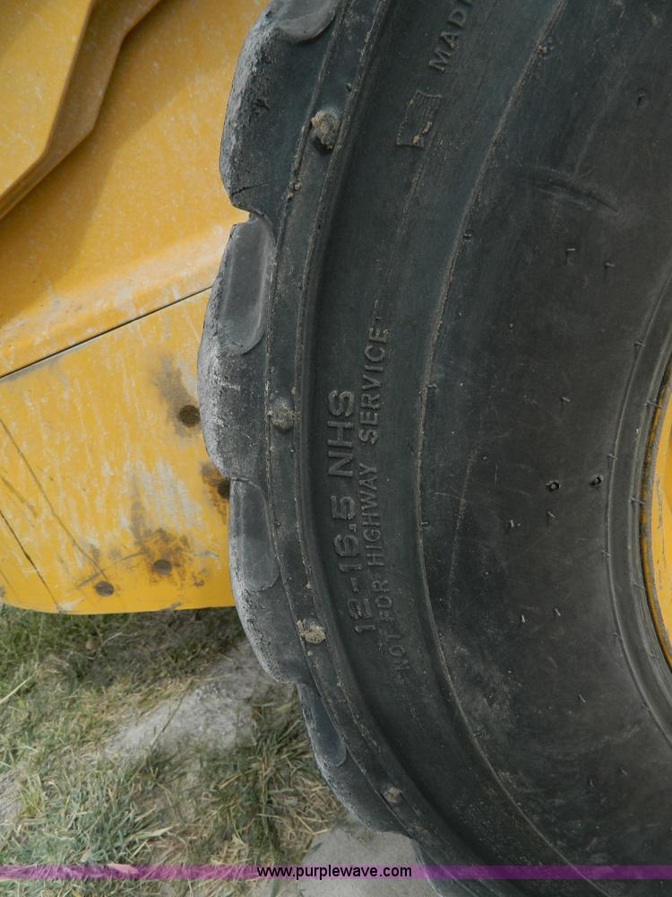 image for item AD9948 2000 John Deere 250 skid steer