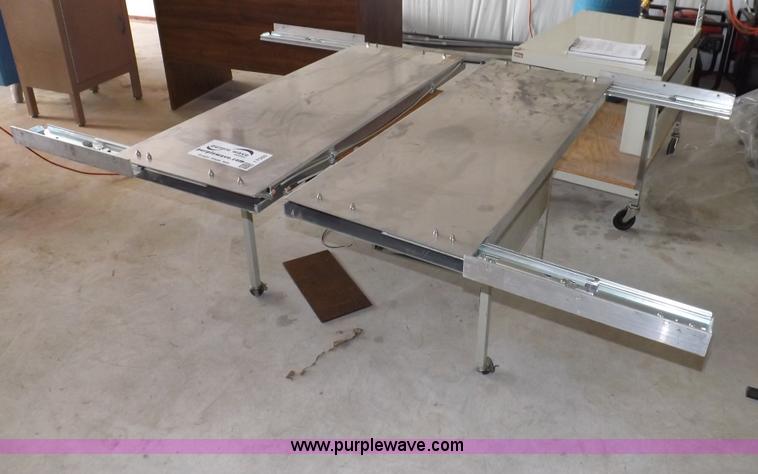 image for item I7505 (2) aluminum retractable shelf units