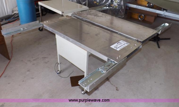 image for item I7505 (2) aluminum retractable shelf units