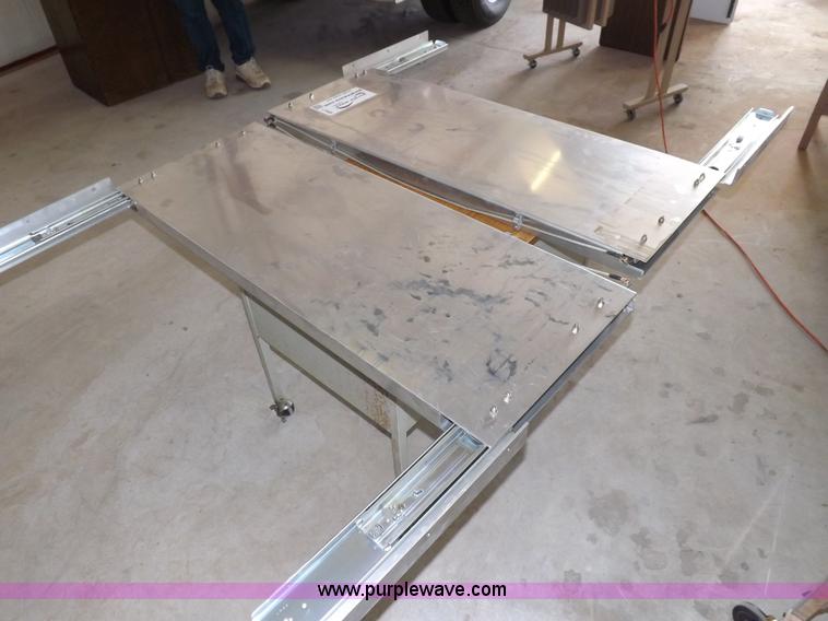 image for item I7505 (2) aluminum retractable shelf units