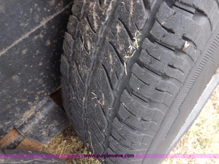 image for item I7544 2003 Paris tandem axle trailer