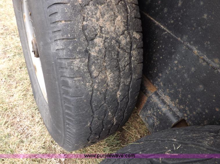 image for item I7544 2003 Paris tandem axle trailer