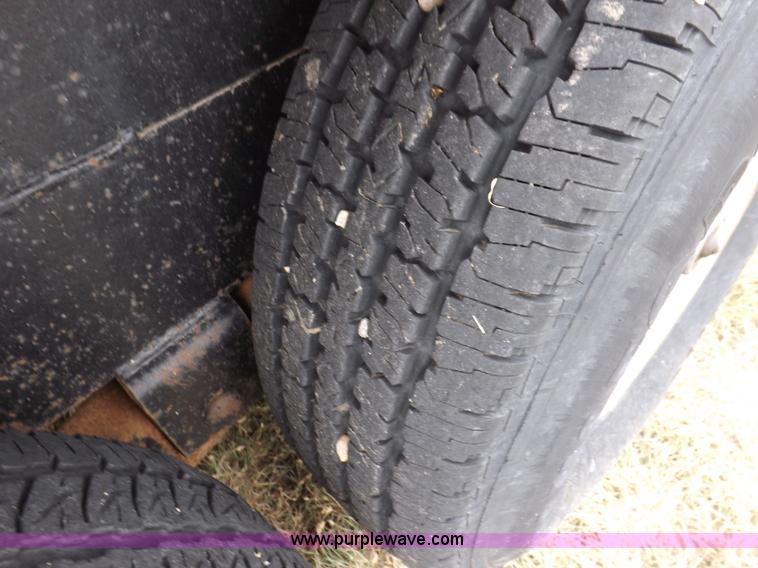 image for item I7544 2003 Paris tandem axle trailer