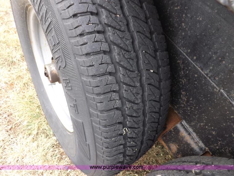 image for item I7544 2003 Paris tandem axle trailer