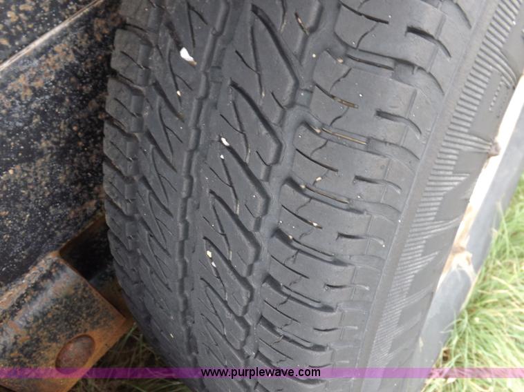 image for item I7545 2003 Paris tandem axle trailer