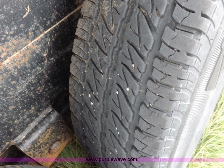 image for item I7545 2003 Paris tandem axle trailer