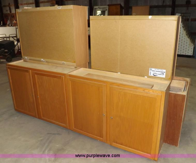 image for item I8366 (8) piece assorted cabinetry