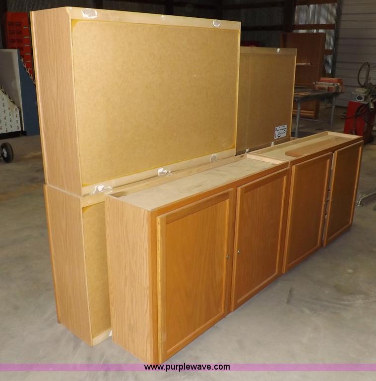 image for item I8366 (8) piece assorted cabinetry